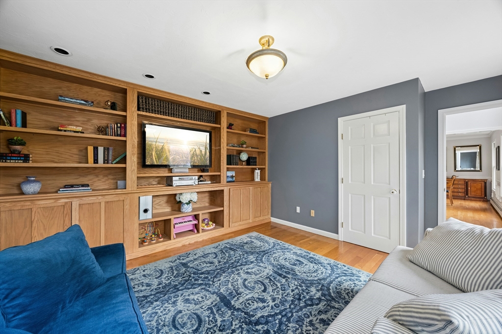 97 Willow Brook Road Holden, MA 01520 - Photo 19 of 42 a living room with furniture and a flat screen tv