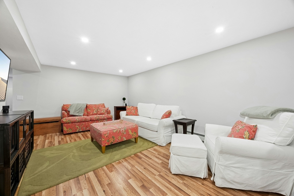 97 Willow Brook Road Holden, MA 01520 - Photo 30 of 42 a living room with couch and a couch