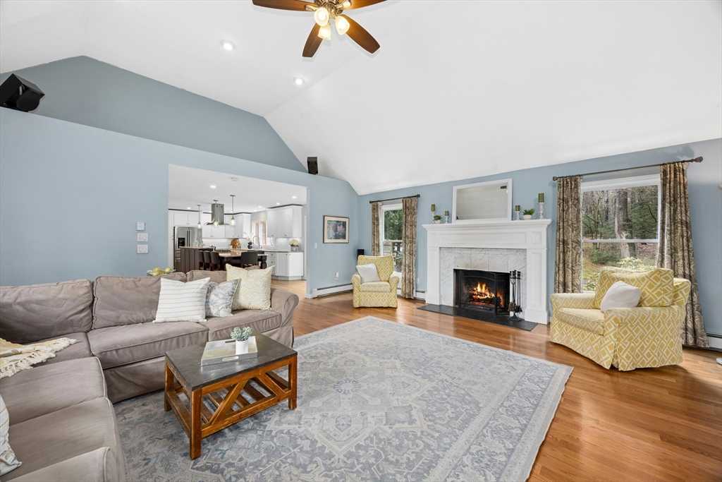 97 Willow Brook Road Holden, MA 01520 - Photo 4 of 42 a living room with furniture and a fireplace