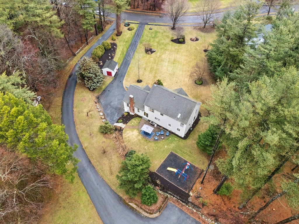 97 Willow Brook Road Holden, MA 01520 - Photo 41 of 42 an aerial view of a house with swimming pool