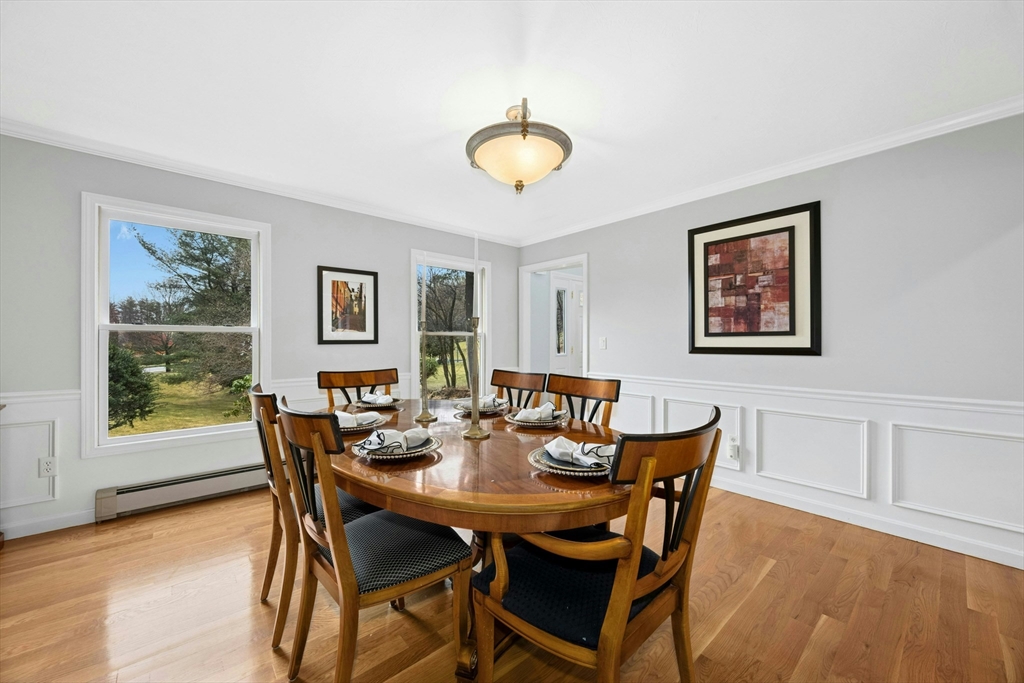 97 Willow Brook Road Holden, MA 01520 - Photo 7 of 42 a view of a dining room with furniture and wooden floor