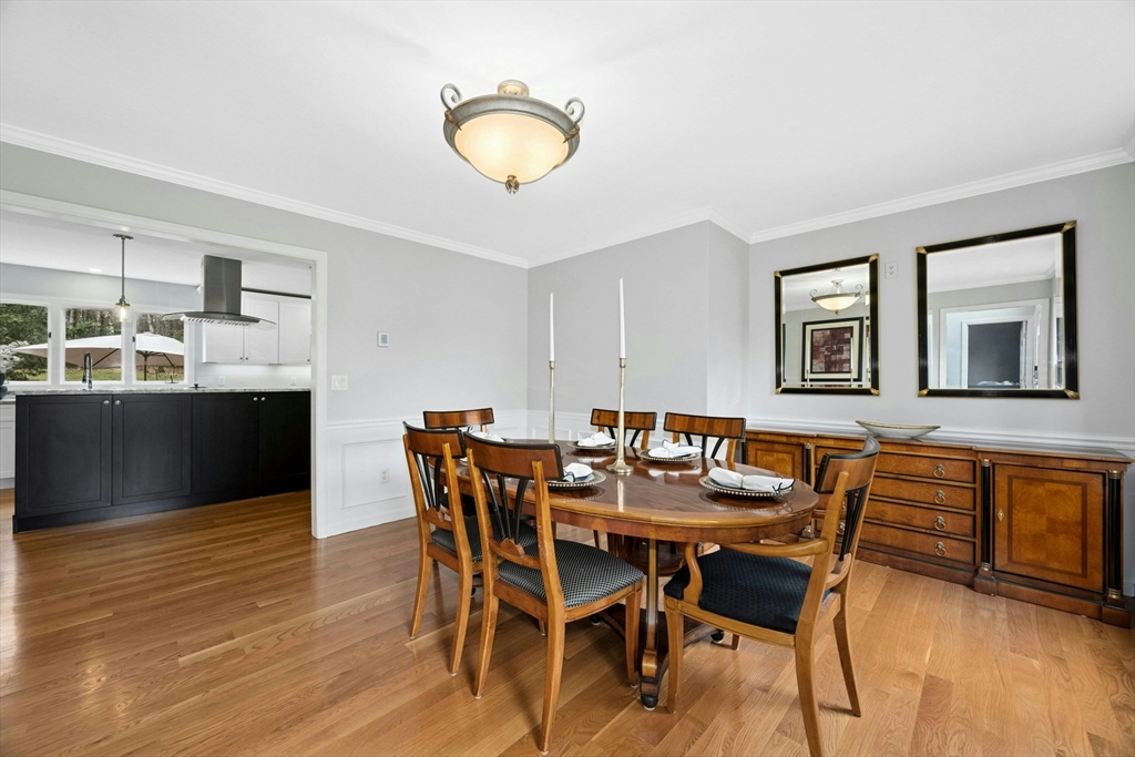 97 Willow Brook Road Holden, MA 01520 - Photo 8 of 42 a view of a dining room with furniture and wooden floor