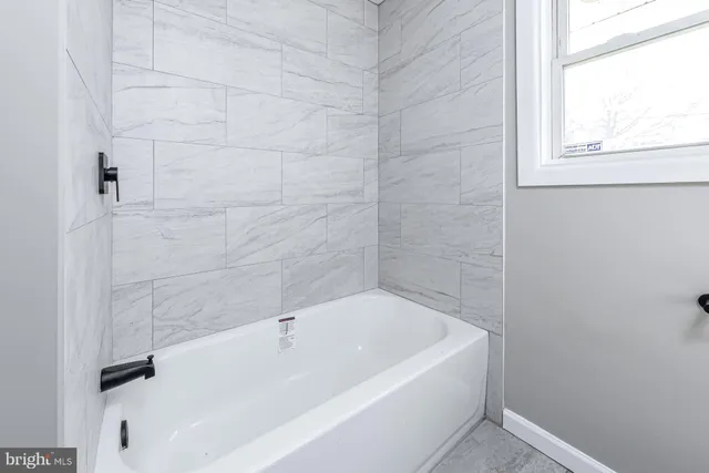 a bathroom with a bathtub