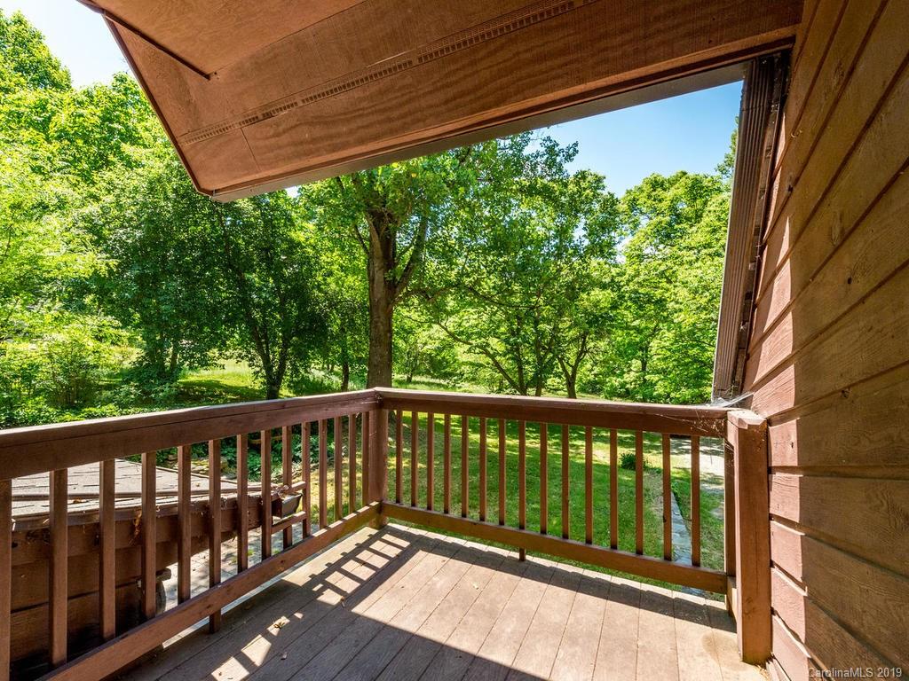 795 Springbrook Farm Road Waynesville, NC 28786 - Photo 21 of 45 a view of a porch
