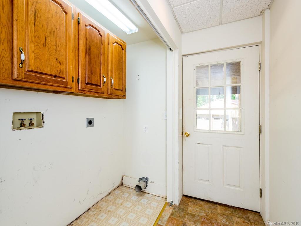 795 Springbrook Farm Road Waynesville, NC 28786 - Photo 30 of 45 a view of a room with wooden floor and cabinet