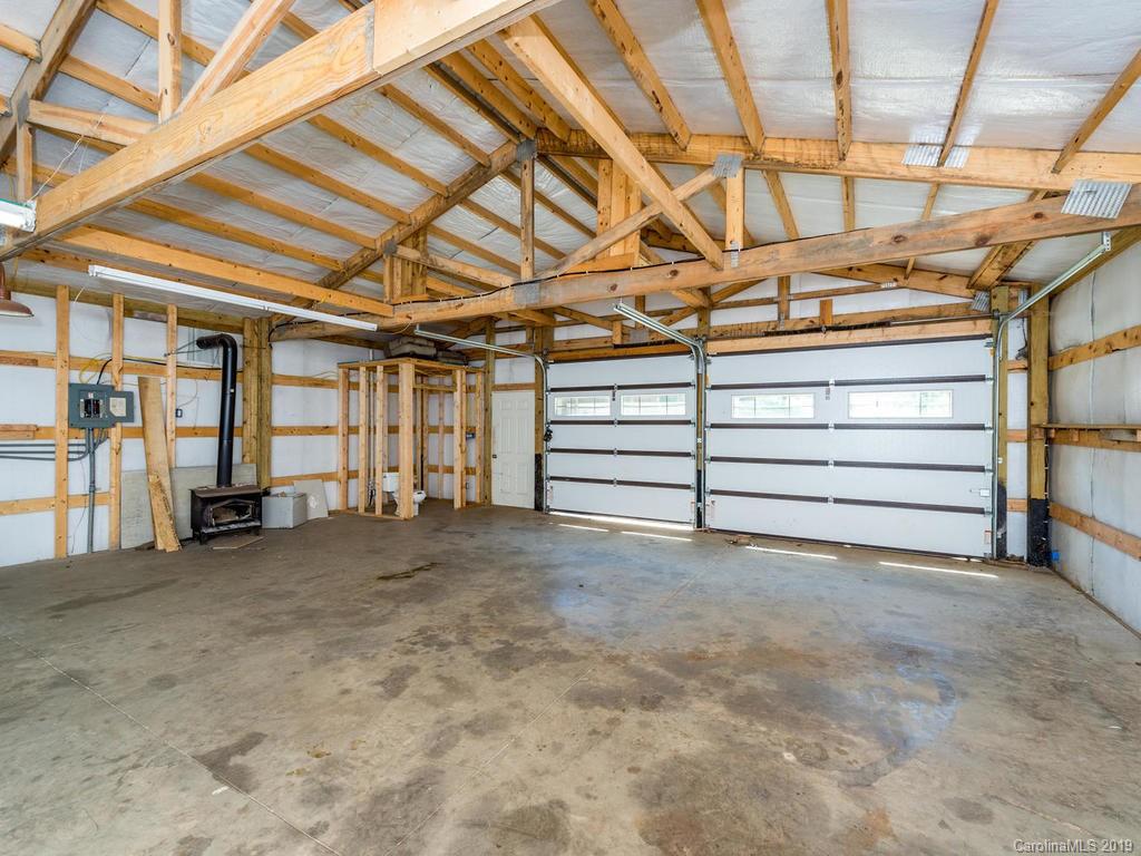 795 Springbrook Farm Road Waynesville, NC 28786 - Photo 35 of 45 a view of an empty room with white walls