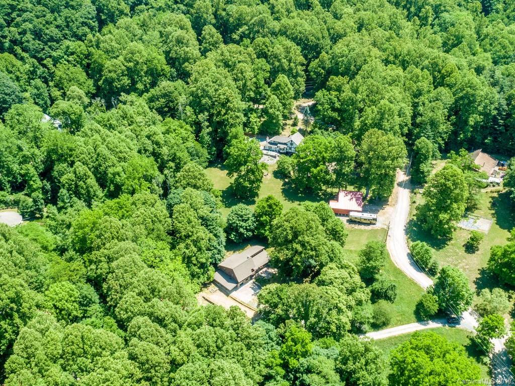 795 Springbrook Farm Road Waynesville, NC 28786 - Photo 40 of 45 an aerial view of residential house with outdoor space and trees all around