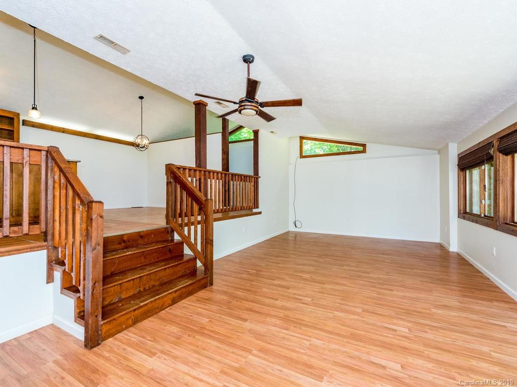 795 Springbrook Farm Road Waynesville, NC 28786 - Photo 5 of 45 a view of an entryway with wooden floor