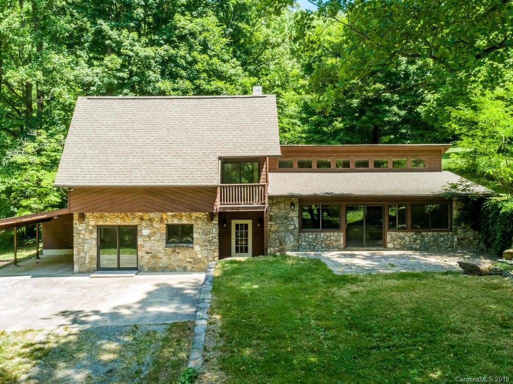 795 Springbrook Farm Road Waynesville, NC 28786 - Photo 44 of 45 front view of a house with a yard