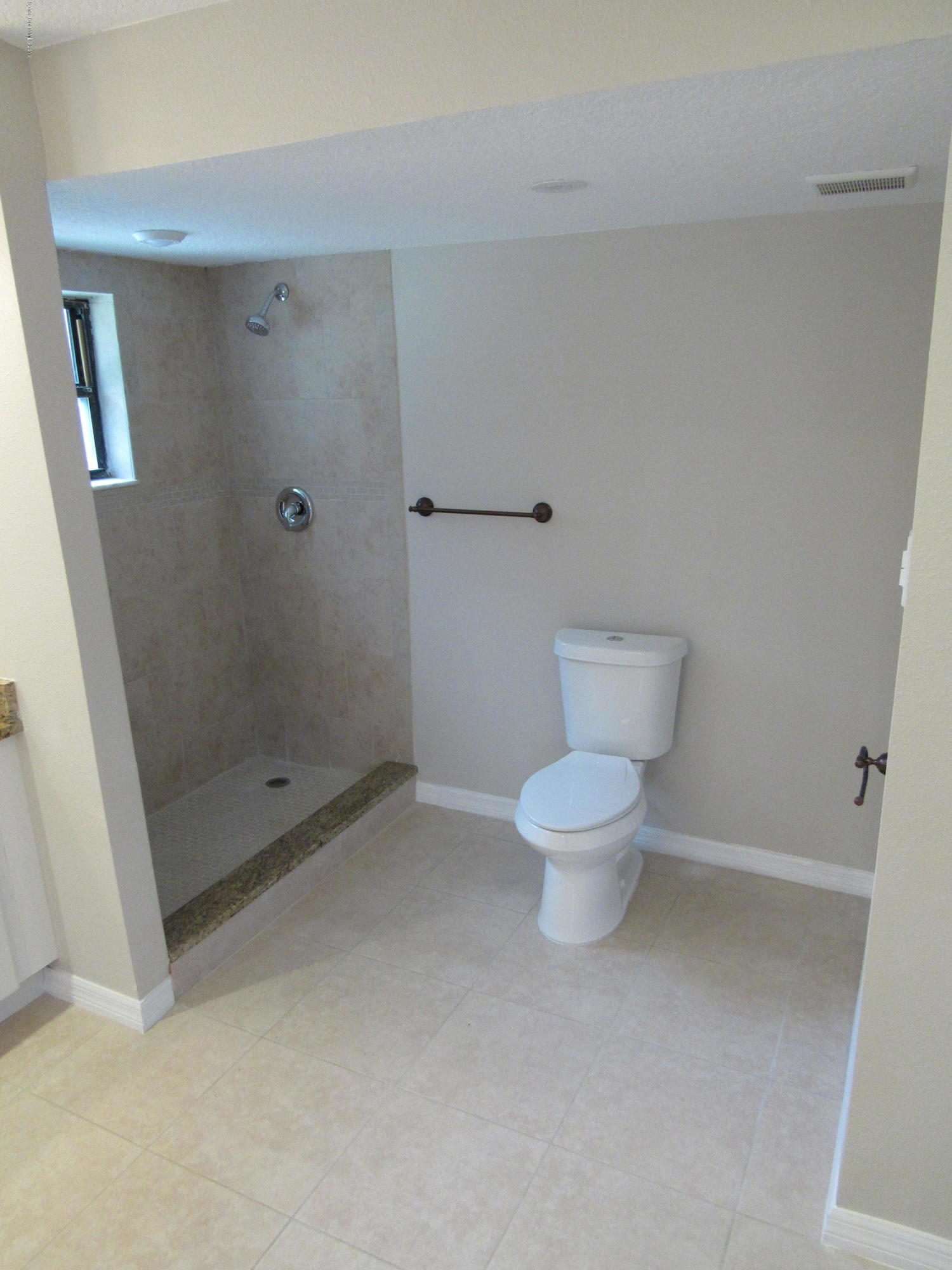 1399 Knecht Road Northeast Palm Bay, FL 32905 - Photo 14 of 35 Master Bath - View 3