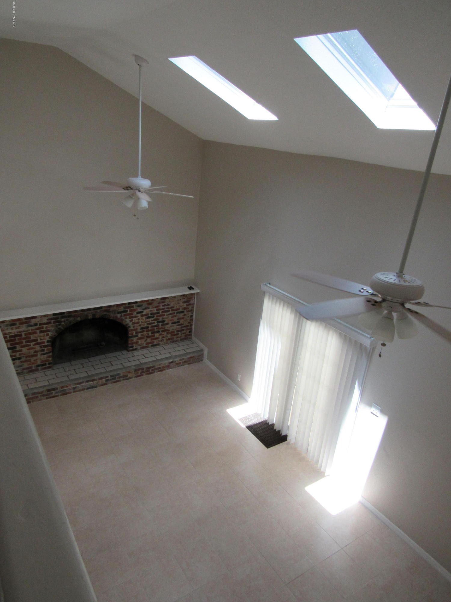 1399 Knecht Road Northeast Palm Bay, FL 32905 - Photo 22 of 35 Upstairs View of Family Room