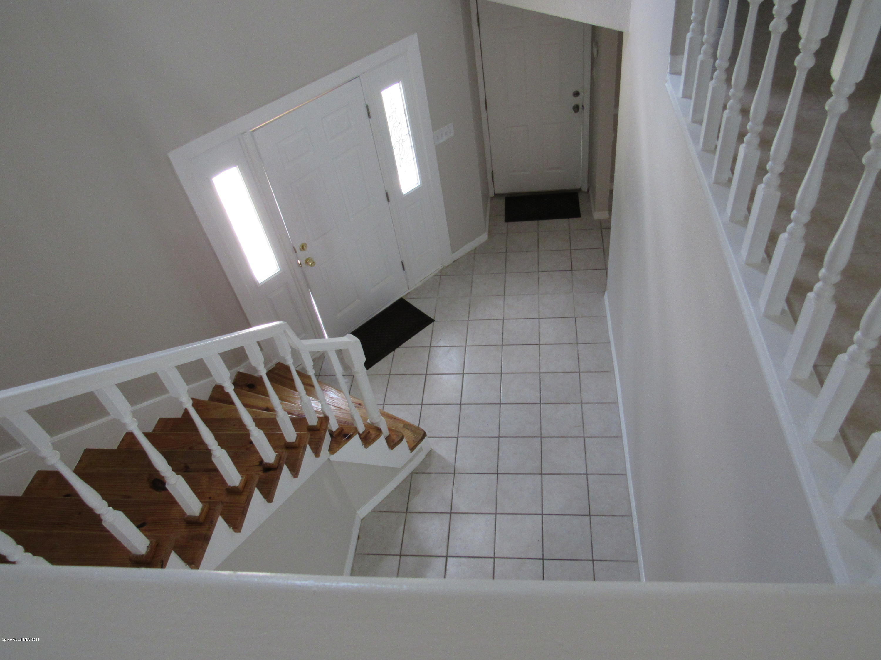 1399 Knecht Road Northeast Palm Bay, FL 32905 - Photo 23 of 35 Foyer - View From Upstairs