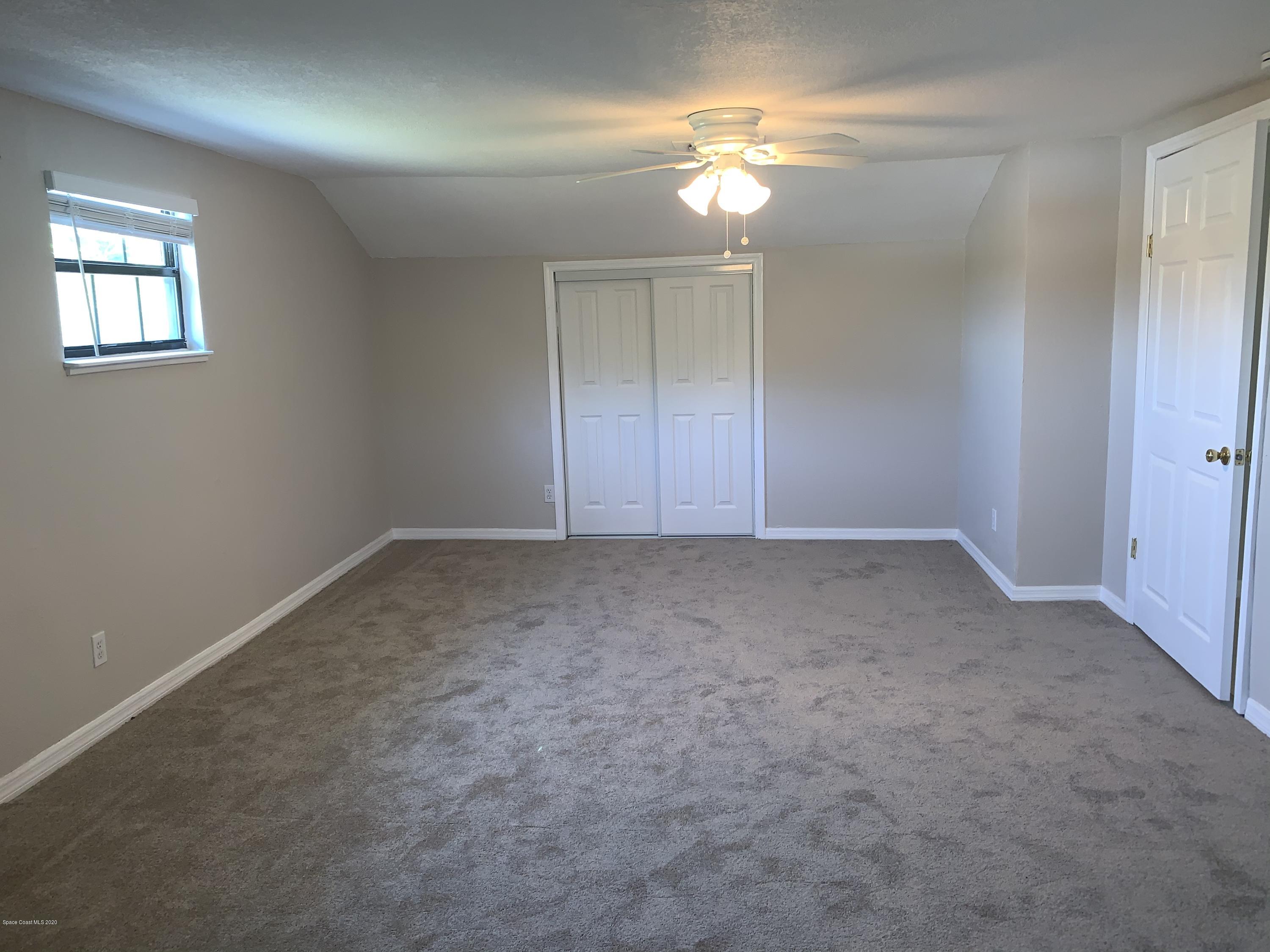 1399 Knecht Road Northeast Palm Bay, FL 32905 - Photo 24 of 35 Bedroom 2