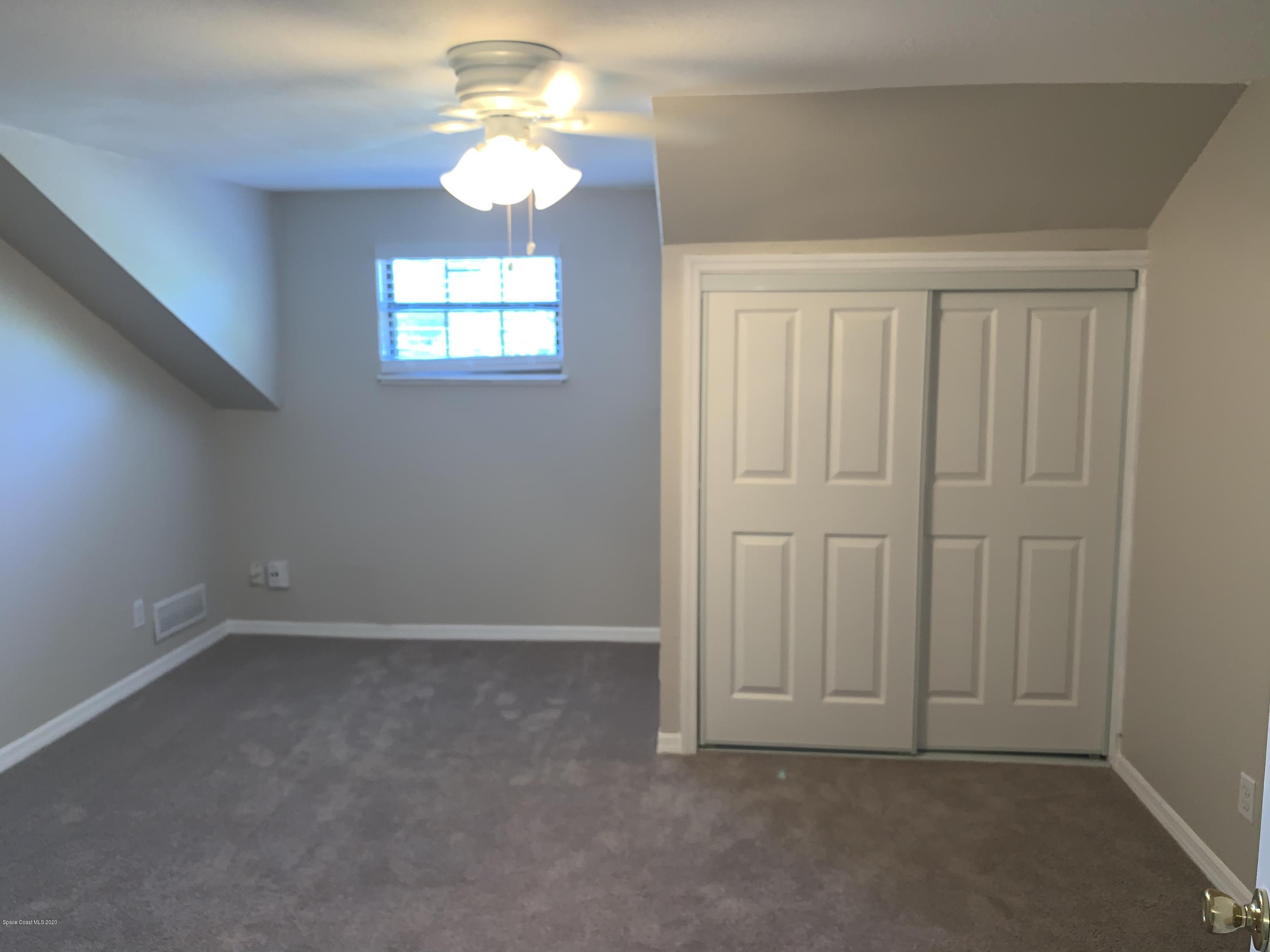 1399 Knecht Road Northeast Palm Bay, FL 32905 - Photo 28 of 35 Bedroom 5