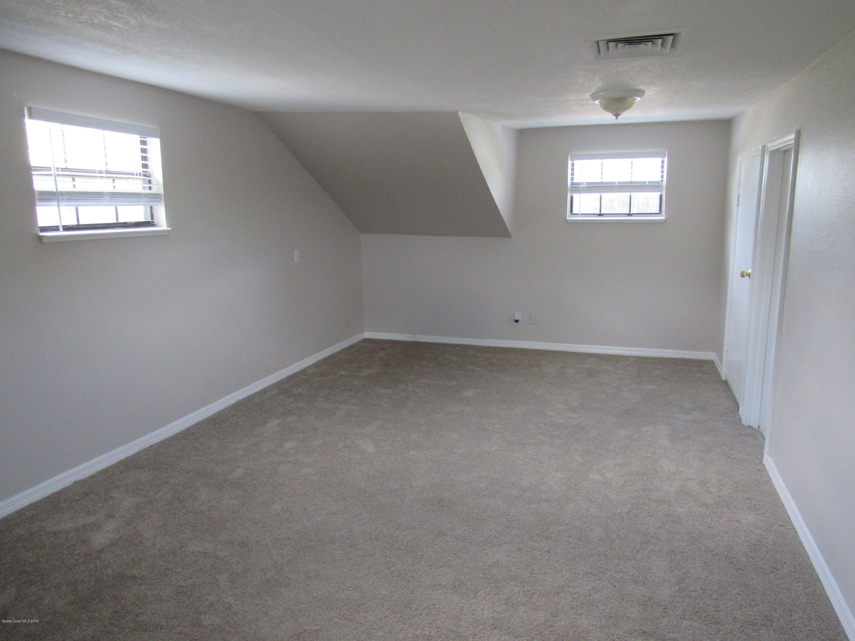 1399 Knecht Road Northeast Palm Bay, FL 32905 - Photo 29 of 35 Bedroom 6