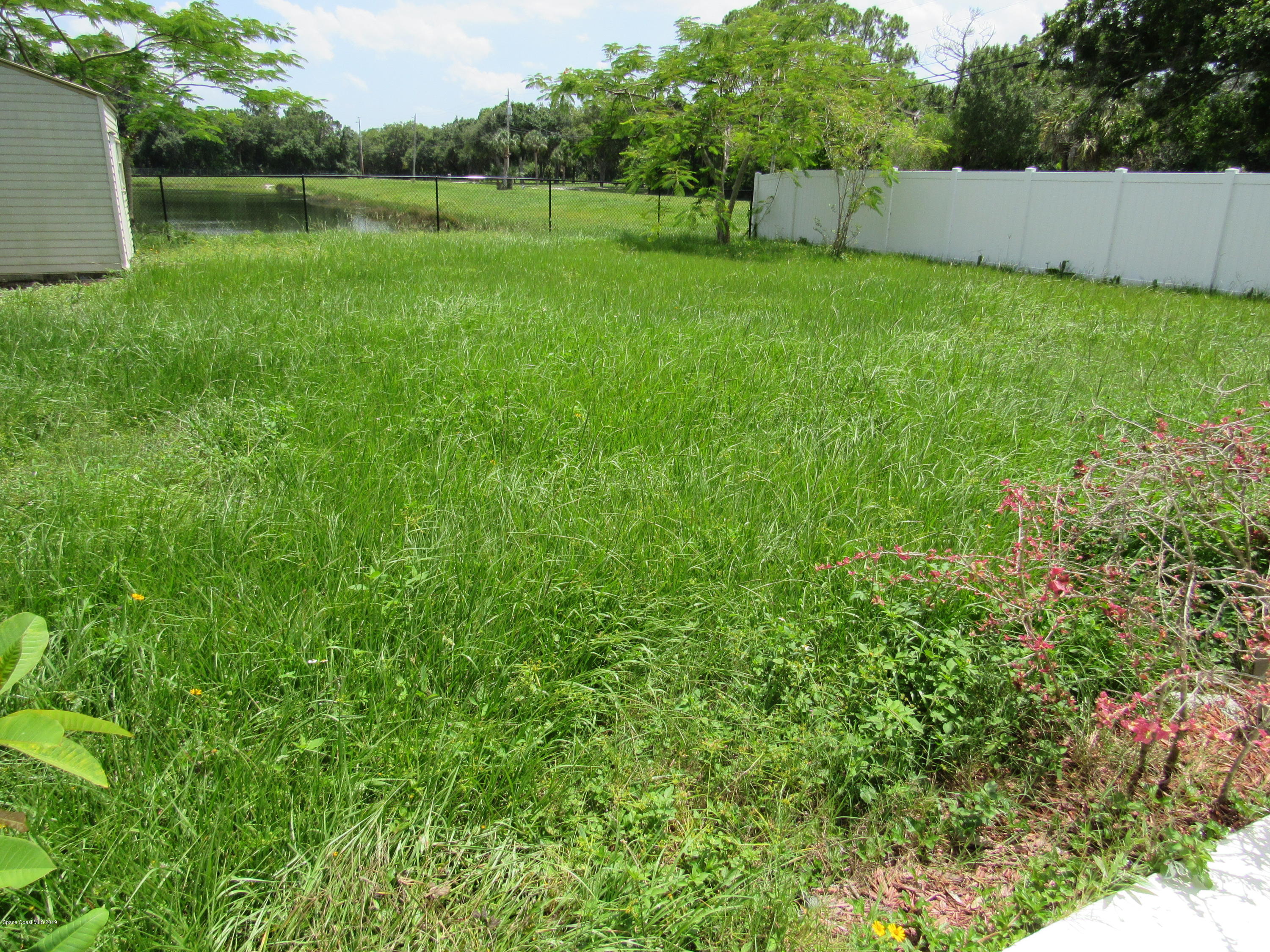 1399 Knecht Road Northeast Palm Bay, FL 32905 - Photo 35 of 35 Rear Yard