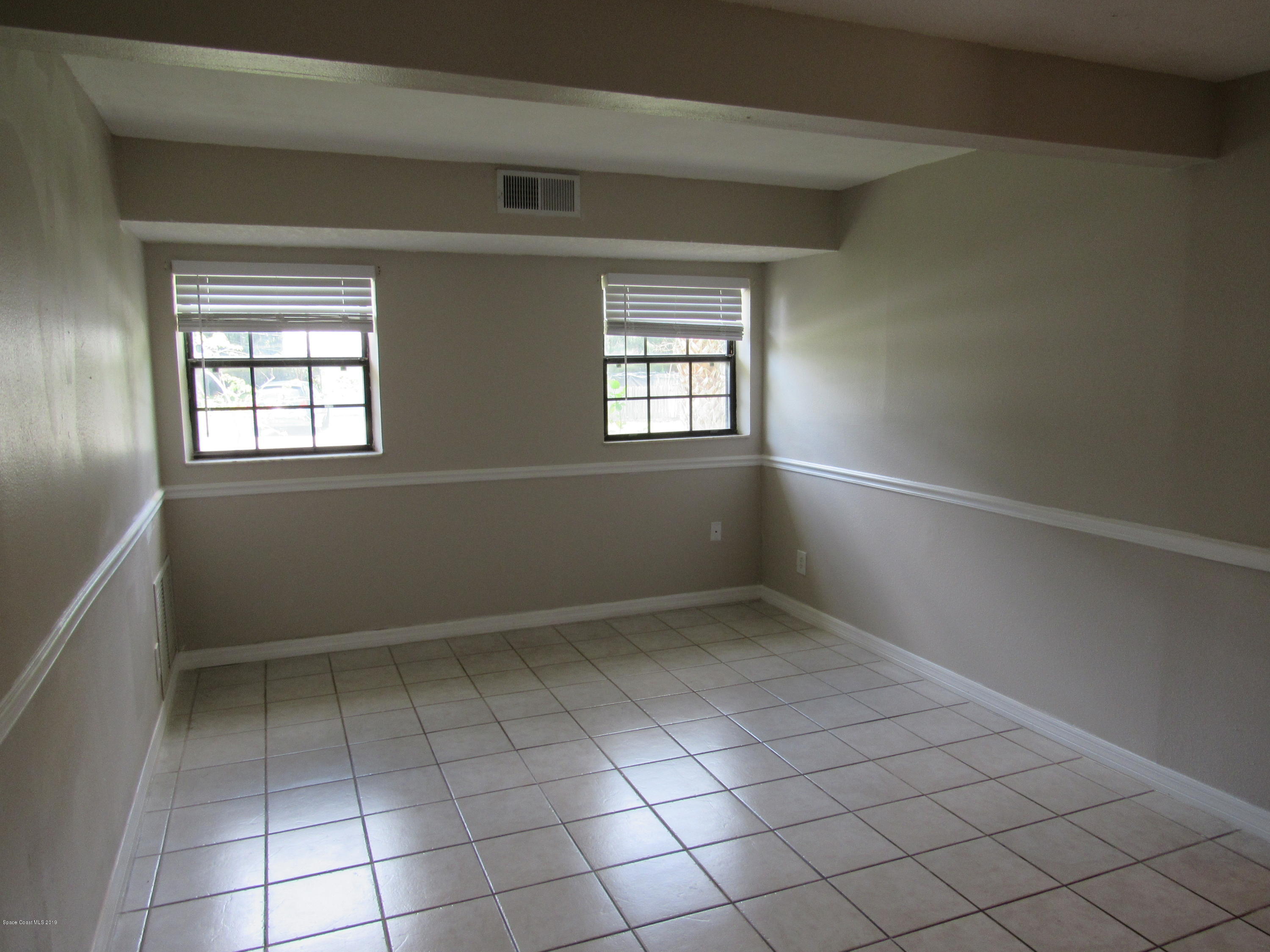 1399 Knecht Road Northeast Palm Bay, FL 32905 - Photo 7 of 35 Dining Room