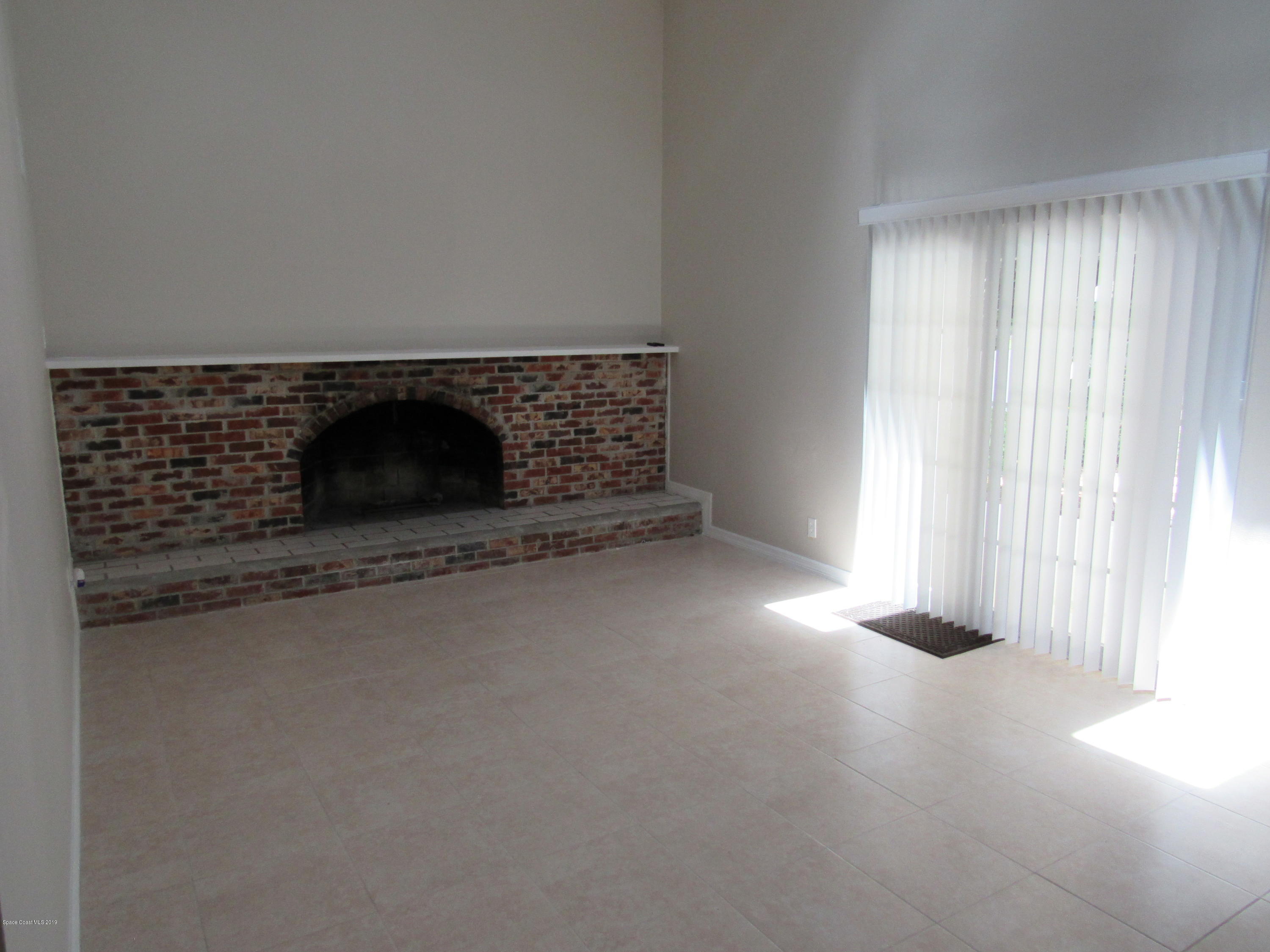 1399 Knecht Road Northeast Palm Bay, FL 32905 - Photo 8 of 35 Sunken Family Room