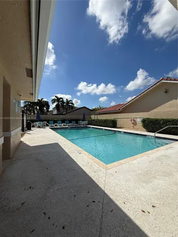 a view of outdoor space with lighting