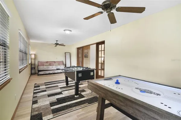 a room with furniture and a chandelier