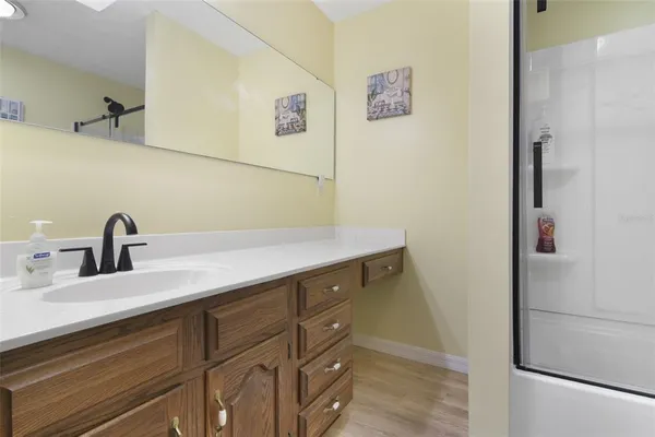 a bathroom with a sink and a mirror