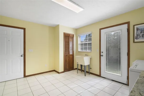 a view of room with furniture and a window