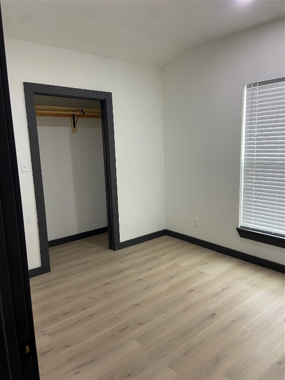 9167 Conner Road Washington, TX 77880 - Photo 14 of 16 a view of a small space with wooden floor and a window