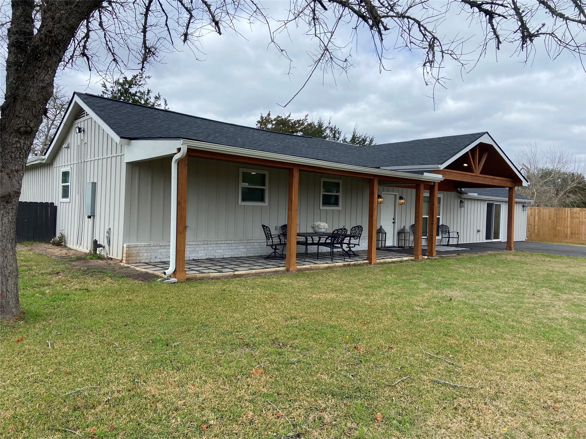 9167 Conner Road Washington, TX 77880 - Photo 3 of 16 a front view of a house with garden