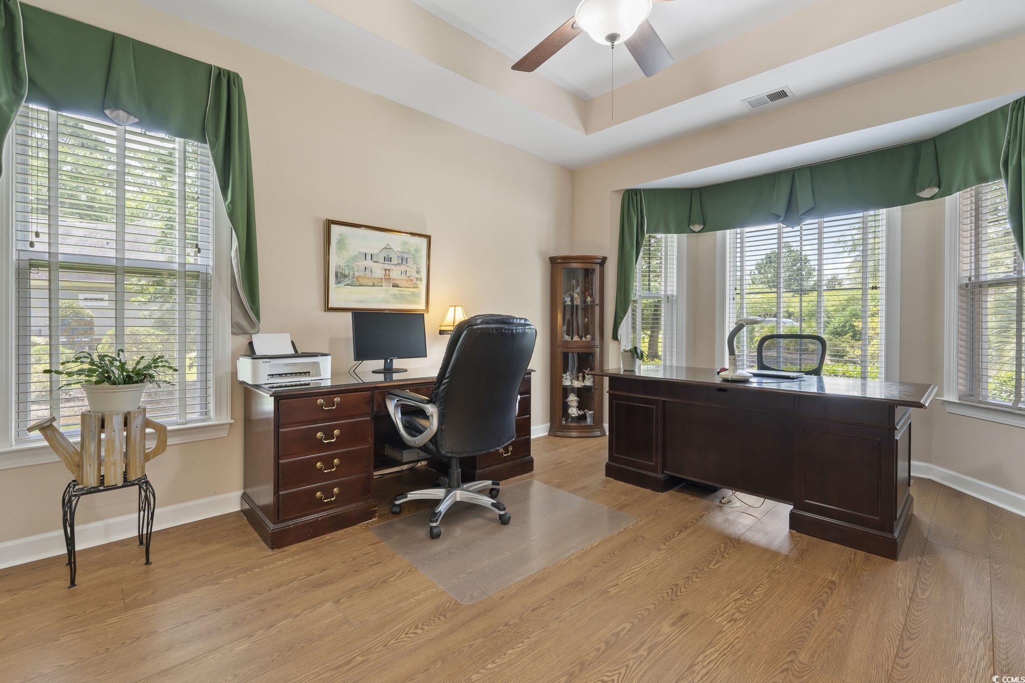 499 Trestle Way Conway, SC 29526 - Photo 22 of 40 Office area featuring light wood finished floors, a ceiling fan, and a raised ceiling