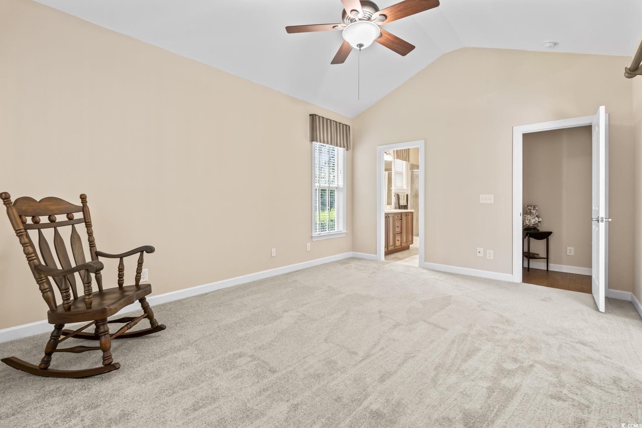 499 Trestle Way Conway, SC 29526 - Photo 29 of 40 Unfurnished room with a ceiling fan, vaulted ceiling, and light colored carpet