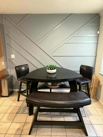 a view of a workspace with furniture