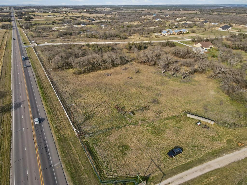 Lot 2 Collier Ranch Road Stephenville, TX 76401 - Photo 9 of 20 an aerial view of residential houses with outdoor space