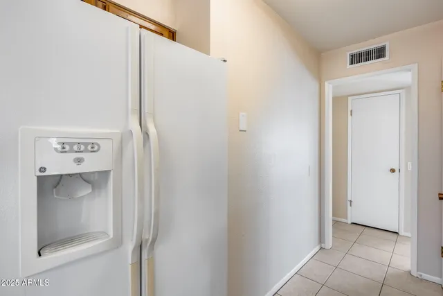 a view of a bathroom with a shower and a sink