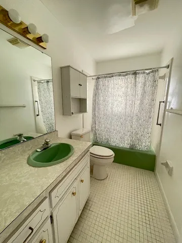 a view of a livingroom with natural light