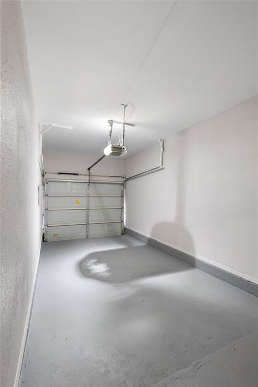 5590 Spring Valley Road, Unit C102 Dallas, TX 75254 - Photo 26 of 31 one car attached garage