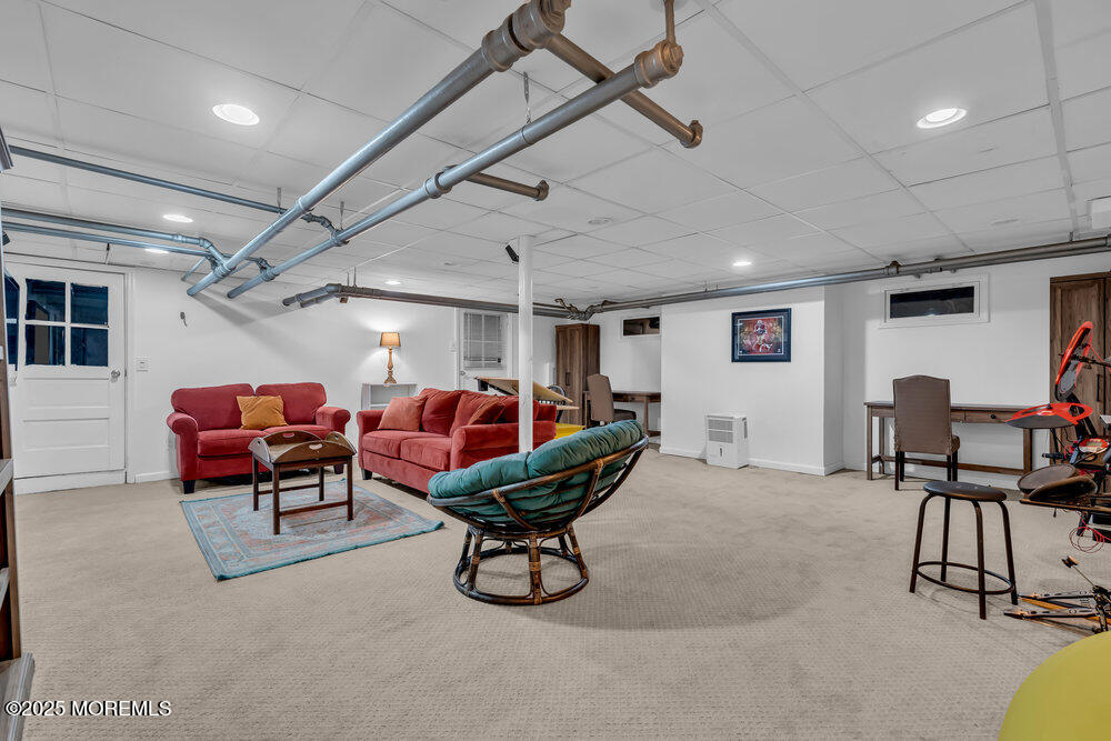 22 Statesir Place Red Bank, NJ 07701 - Photo 20 of 34 a living room with furniture a air conditioner vent and a window