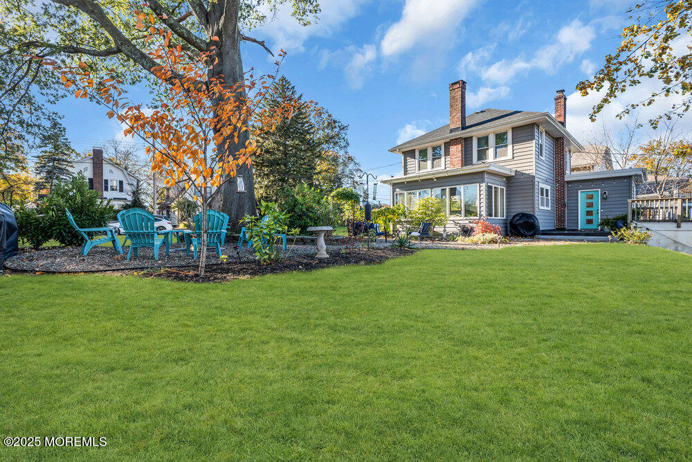22 Statesir Place Red Bank, NJ 07701 - Photo 24 of 34 a front view of a house with a yard