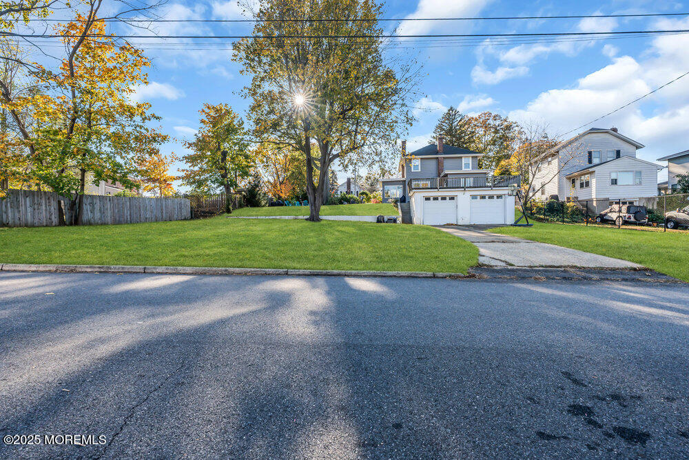 22 Statesir Place Red Bank, NJ 07701 - Photo 26 of 34 a view of a house with a yard and garage