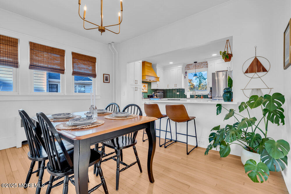 22 Statesir Place Red Bank, NJ 07701 - Photo 4 of 34 a view of a dining room with furniture and wooden floor