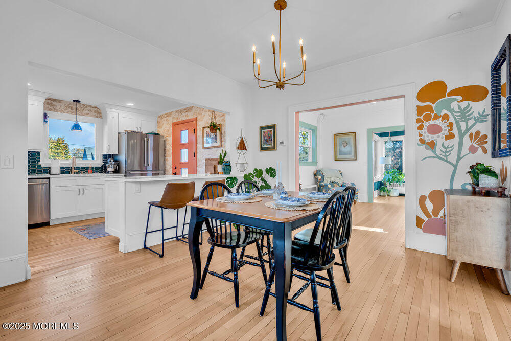 22 Statesir Place Red Bank, NJ 07701 - Photo 5 of 34 a view of a dining room with furniture and wooden floor