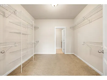 a utility room with sink dryer and washer