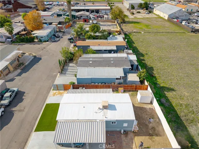 an aerial view of a house with a garden