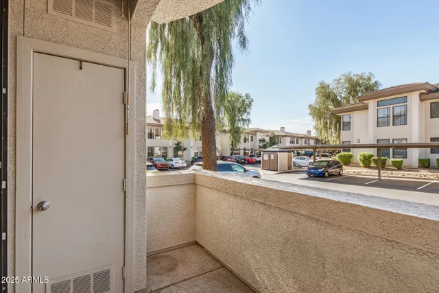 a view of a street with cars