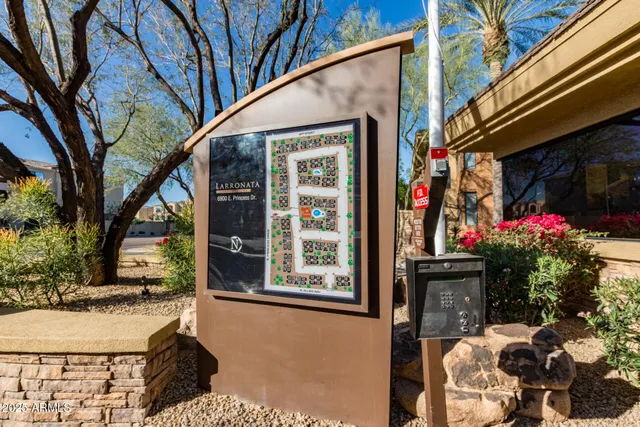 a view of a house with a small yard
