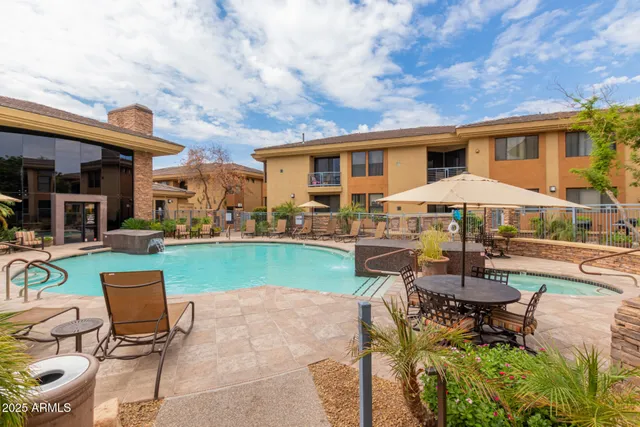 a view of a house with backyard porch and patio
