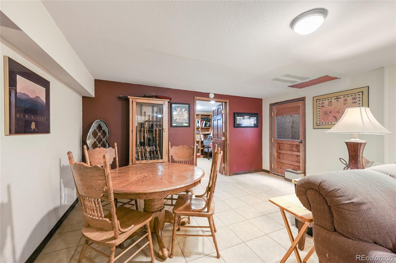 5430 Murr Road Peyton, CO 80831 - Photo 40 of 50 a bedroom with a bed and a table chair