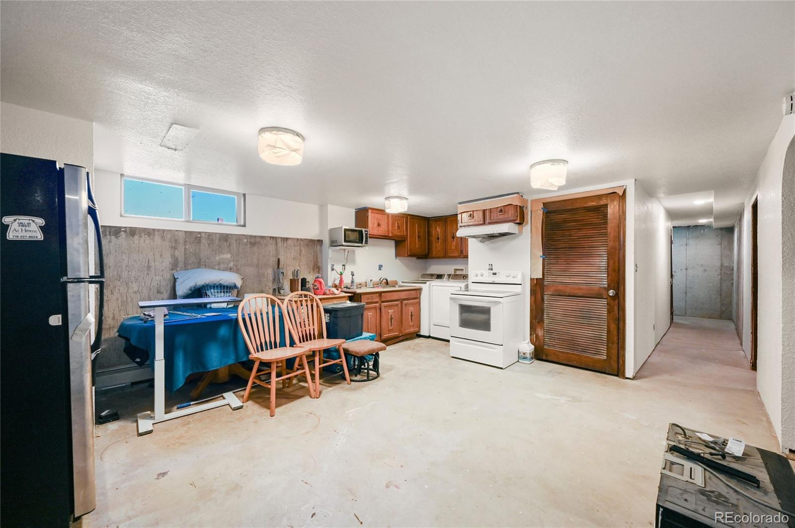 5430 Murr Road Peyton, CO 80831 - Photo 43 of 50 a view of kitchen and refrigerator