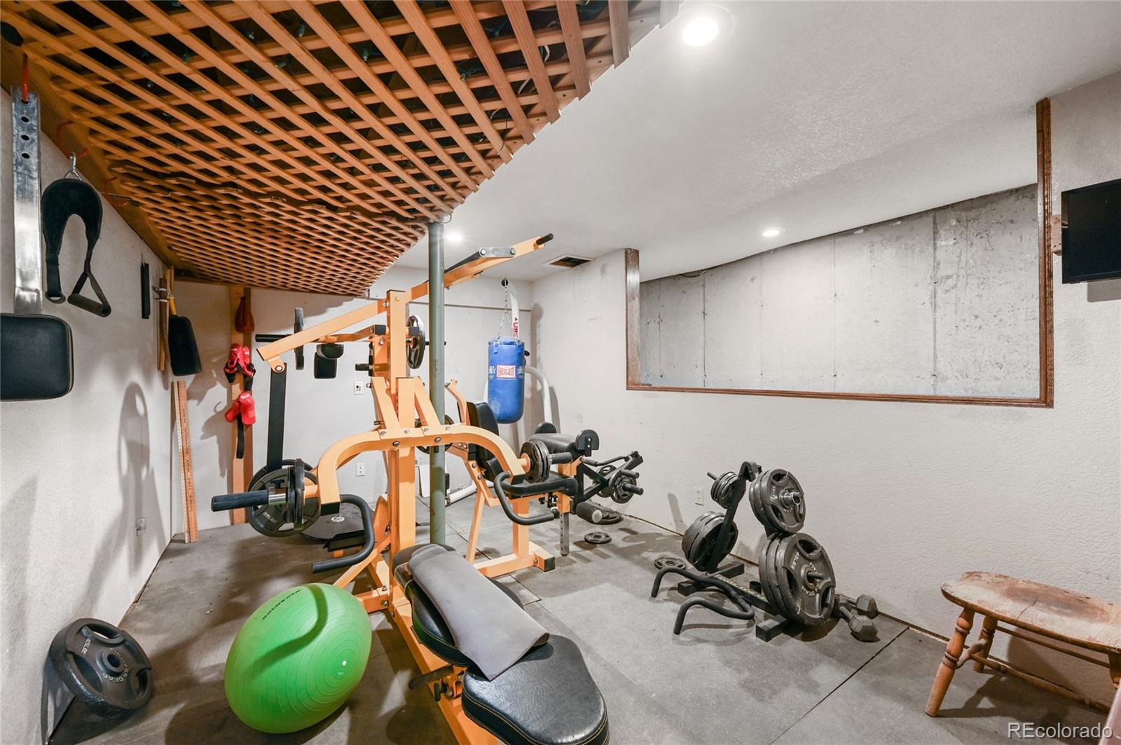 5430 Murr Road Peyton, CO 80831 - Photo 44 of 50 a view of a room with gym equipment