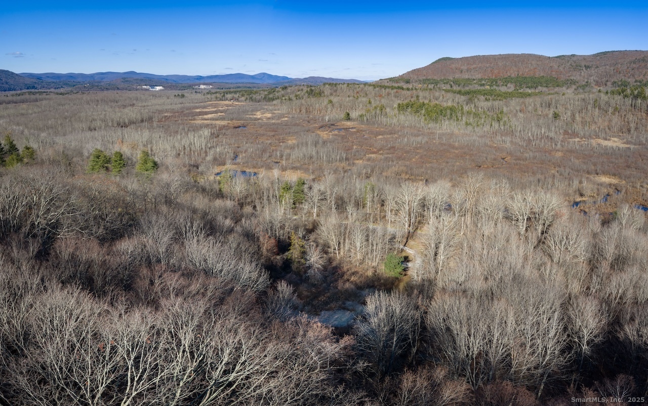 66 Barnes Road Canaan, CT 06031 - Photo 2 of 15 a view of lake with mountain