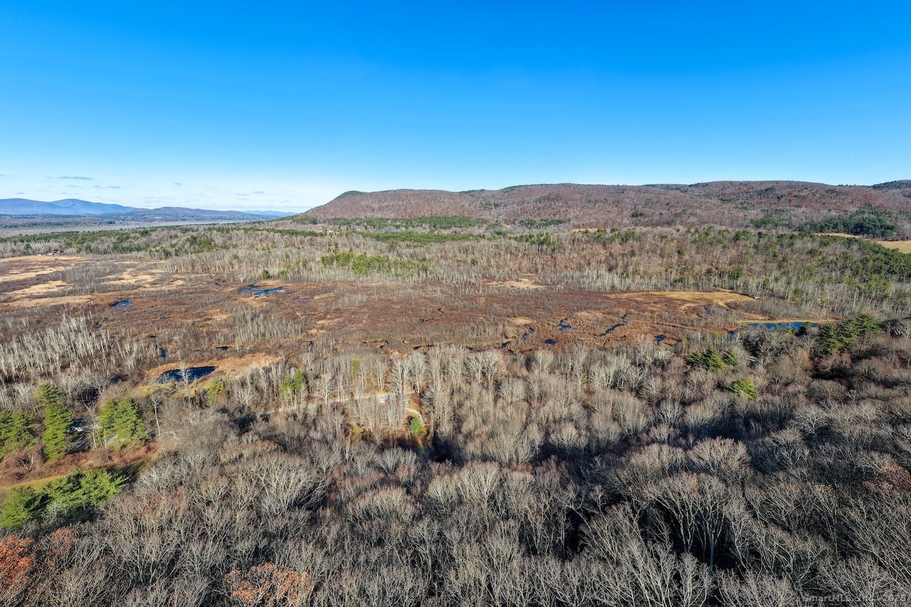 66 Barnes Road Canaan, CT 06031 - Photo 5 of 15 a view of an outdoor space and a lake view